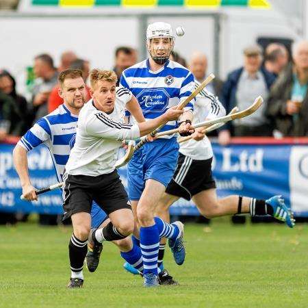 Lorne Mackay heads the chase for a loose ball. Picture: Neil Paterson.