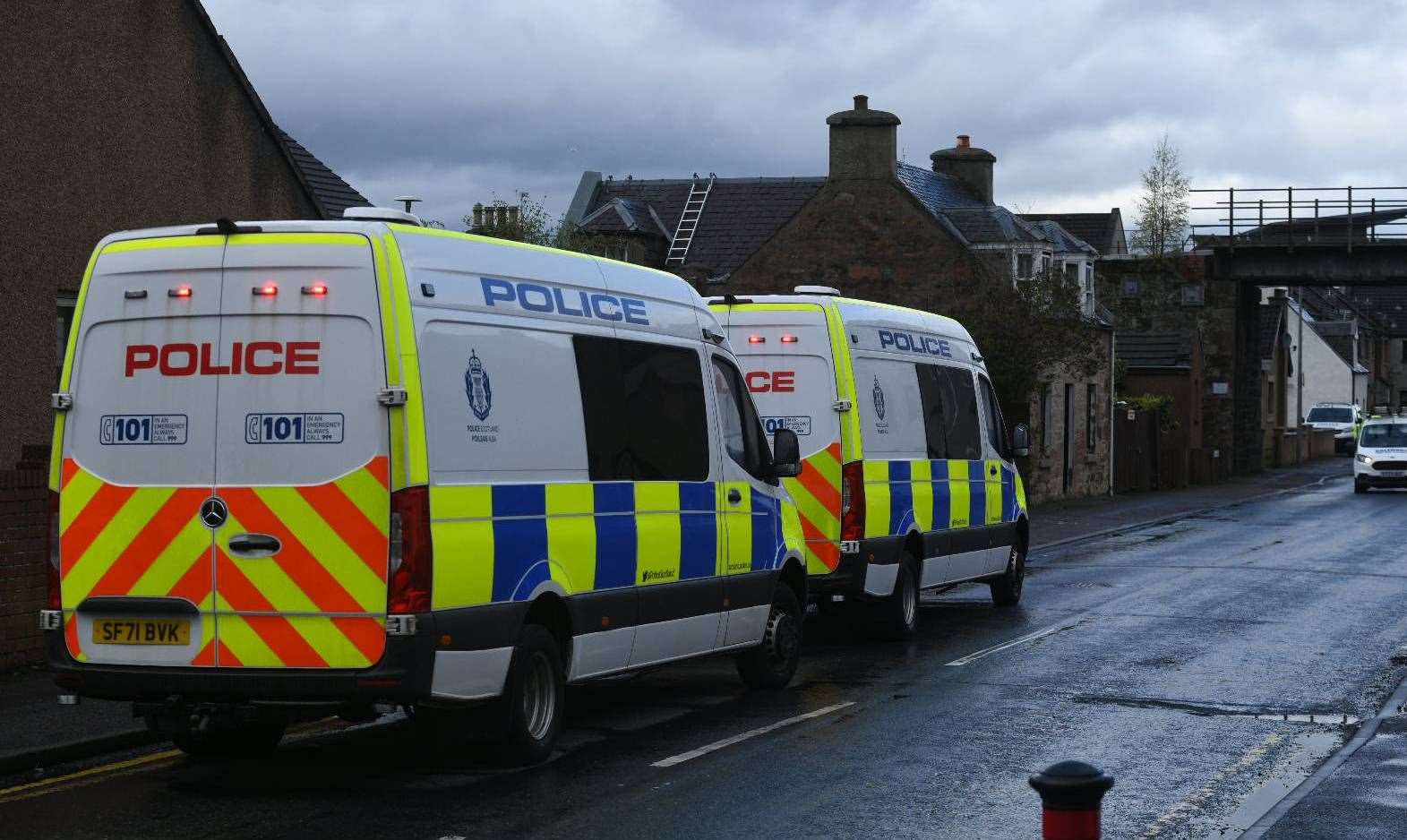 Police vans parked near the scene of an incident in the Grant Street area of Inverness. PICTURE: JAMES MACKENZIE