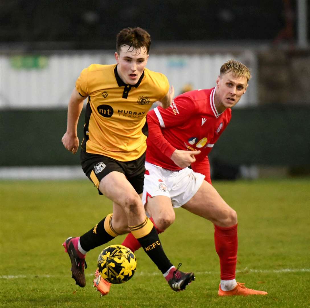 Former ICT teammates face off as Nairn County's Aaron Nicolson goes up against Brechin City's Kevin McHattie. Picture: James Mackenzie