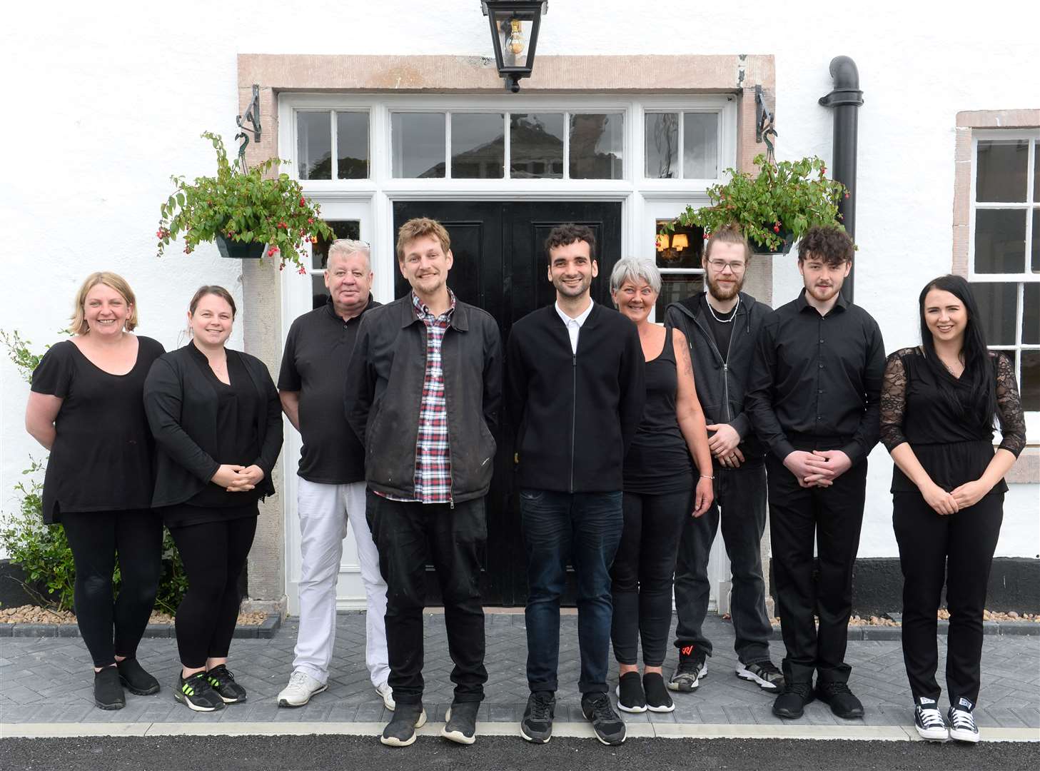 Conon Hotel.Staff team with owners David and Joseph Whiteford (centre).Picture Gary Anthony..