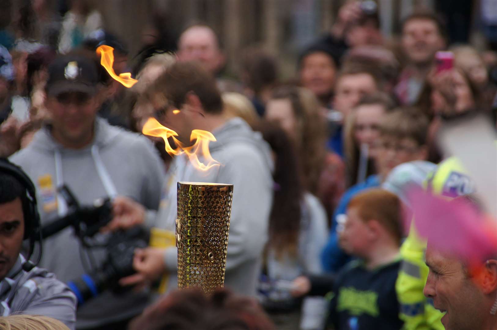 The Olympic Torch passed through Inverness in June 2012 on its journey around Britain before the Games in London. Norman Smart captured its visit.