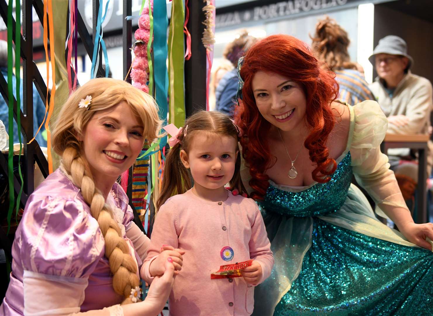 Orla Wood meets Rapunzel (Michelle Newell) and Ariel (Jo Galloway) from See Chelle's Characters. Picture: James Mackenzie