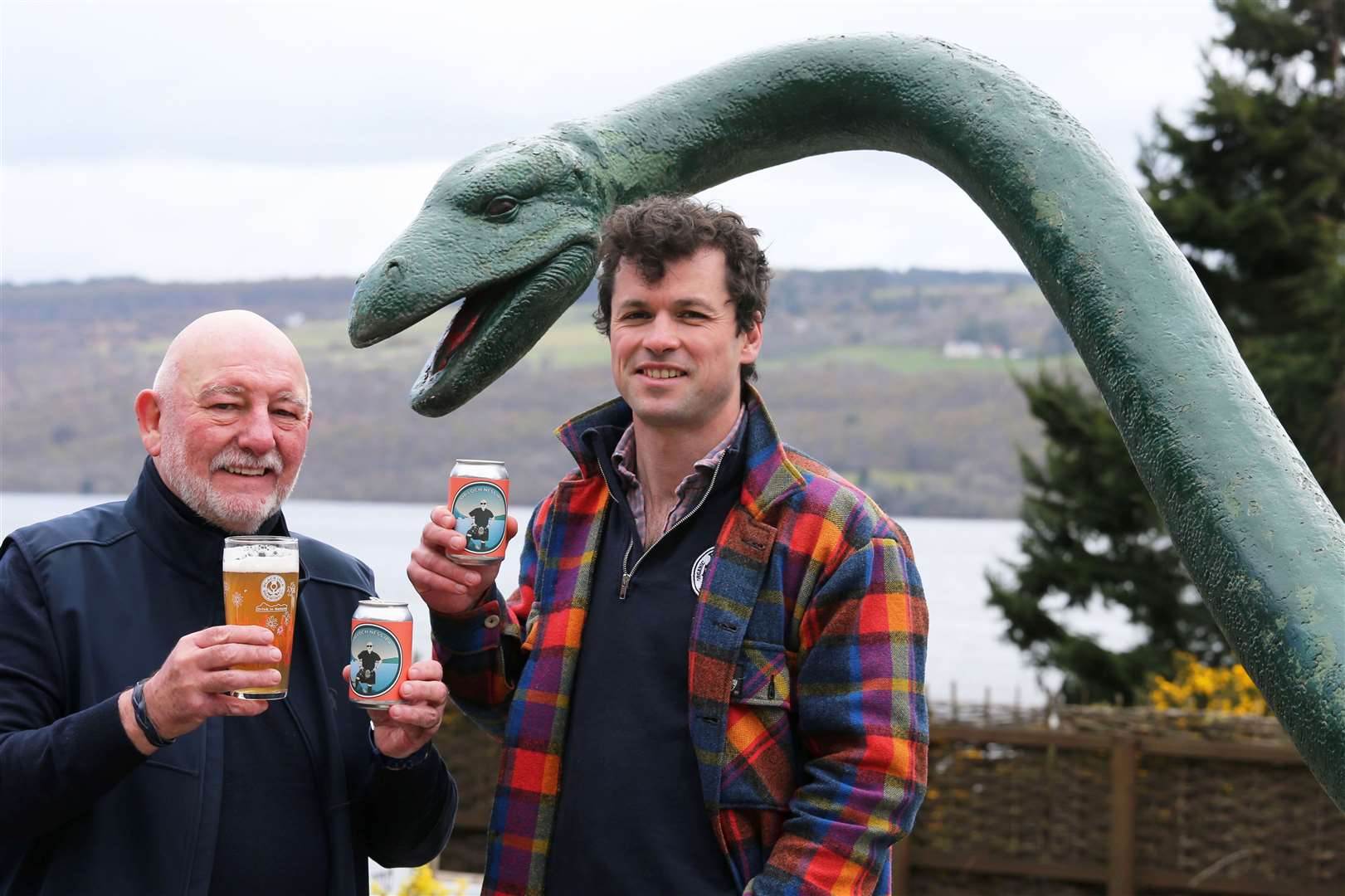 "Mr Loch Ness" Willie Cameron, left, with Lawrie Wotherspoon of Black Isle Brewery with the special beer. Pic Peter Jolly