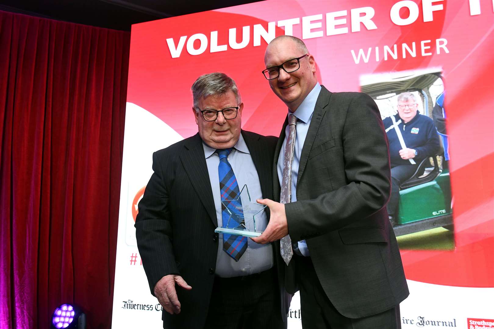 Ronnie Mitchell was named volunteer of the year 2023 and received his award from Chris Dowling of sponsor Cairngorm Group. Picture: James Mackenzie