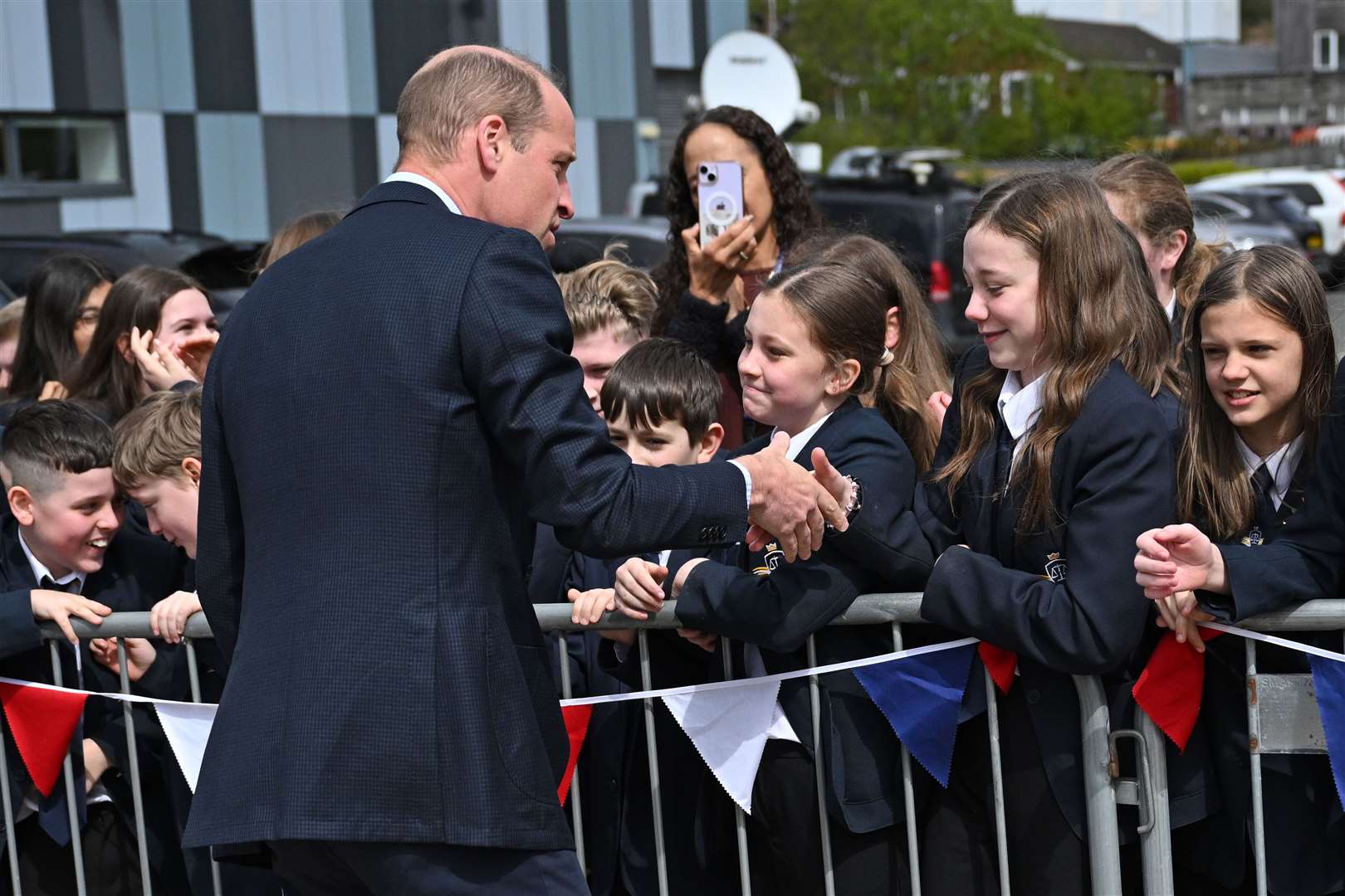 William shook the hands of dozens of school children when he left. Oli Scarff/PA