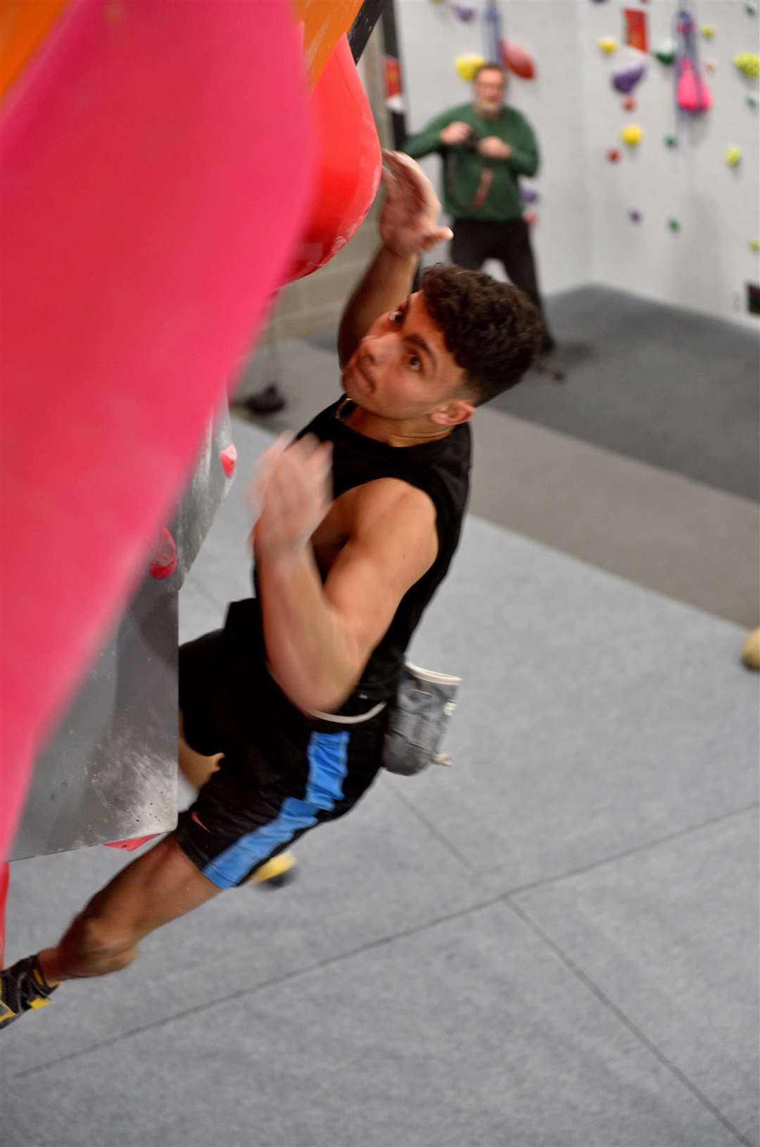 Reuben Langlands tackles one of the bouldering challenges during the competition. Picture: Ben Clarke